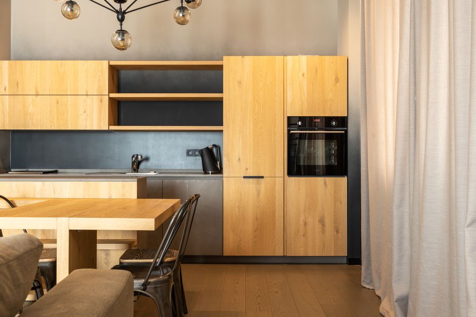 Modern kitchen interior featuring premium custom cabinets and sleek countertops